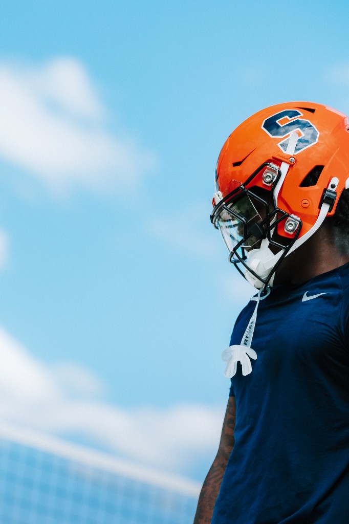 BJ Garrett on the sideline in an orange helmet